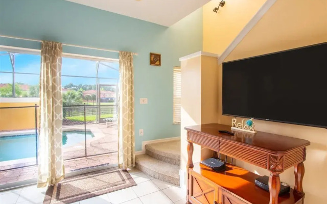 Private Screened Splash Pool Overlooking Tranquil Lake Right Beside Disney World by Florida Dream Homes