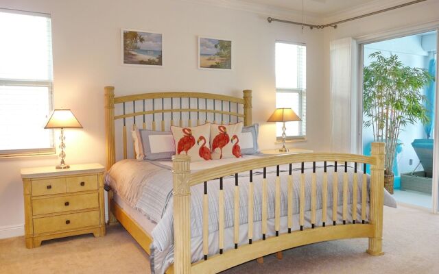 Relaxing Waterfront Home With Pool and Steps to Beach