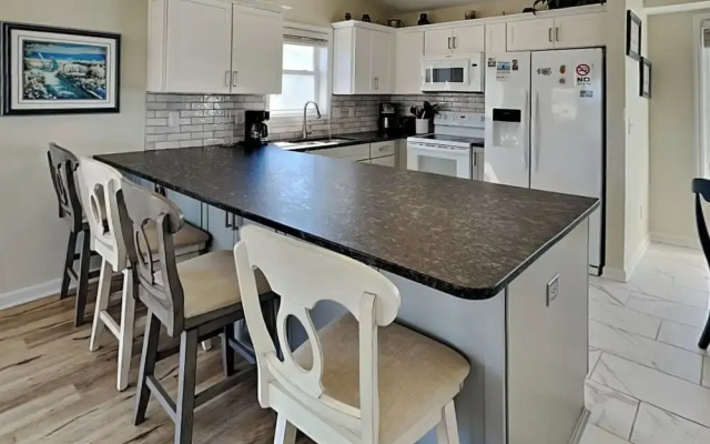 Song Of The Sea by Topsail Realty