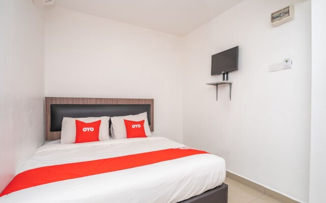 VRM Hotel by OYO Rooms
