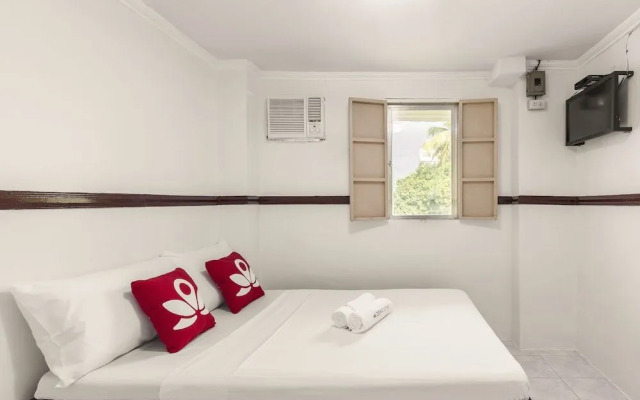 City Smiles Apartelle by OYO Rooms