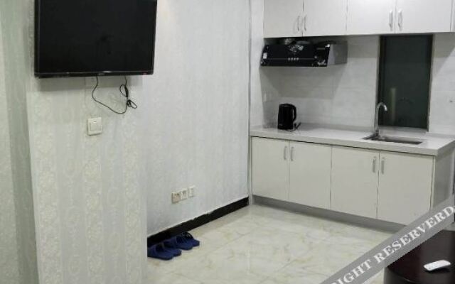 Xinshiguang Apartment Hostel