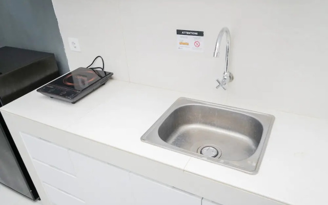 Comfort and Cozy Studio Room Apartment at Springwood Residence