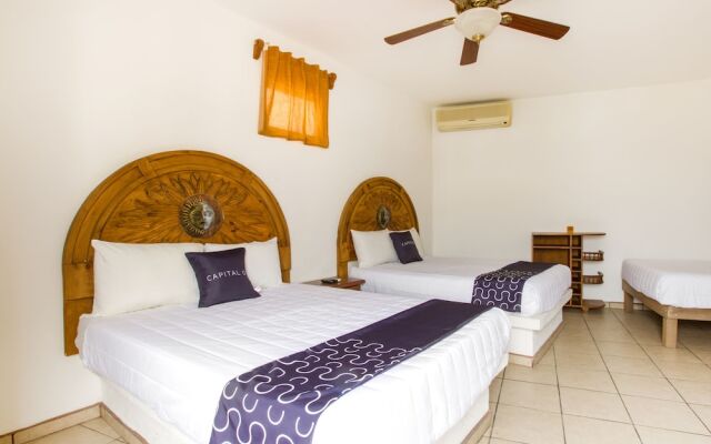 Capital O Hotel J y M