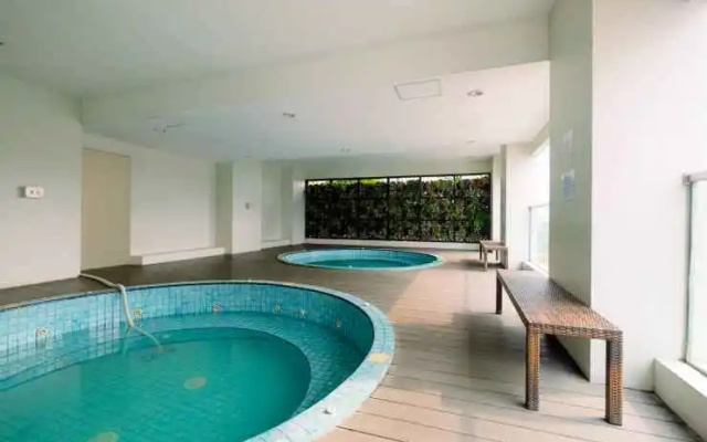 New Furnished 2BR Apartment at Capitol Park Residence By Travelio