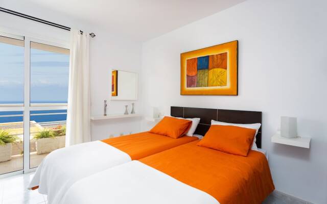 Duplex Acorán with pool and sea view