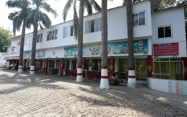 The Palms Resort By OYO Rooms