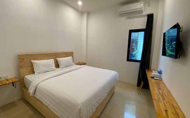 Urbanview Hotel Medio Inn Palu By Reddoorz – Guest Rooms – Palu