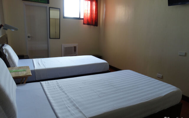 RueMango Apartelle and Suites
