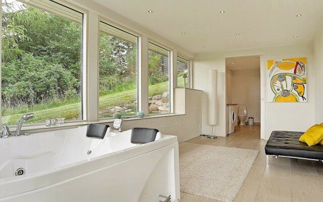 Modern Holiday Home in Brovst with Hot Tub
