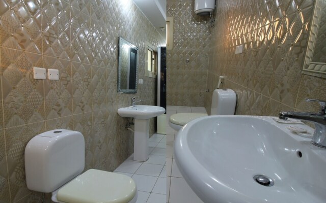 OYO 594 Taj Lamar Furnished Apartments