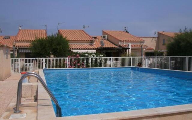 Maison avec piscine collective sur Gruissan 6MIN39