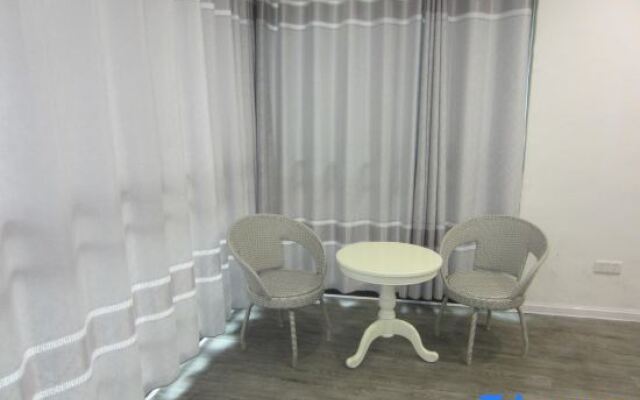 Qidong Baolian Fashion Inn