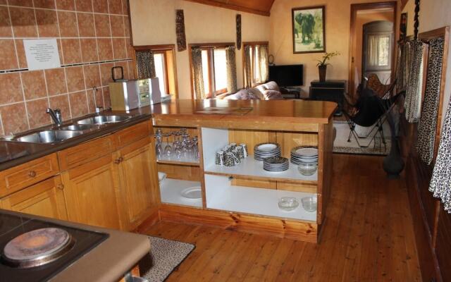Krinklewood Cottage and Train Carriages
