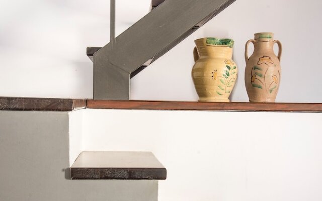 Terrazza e stile sui tetti della Kalsa