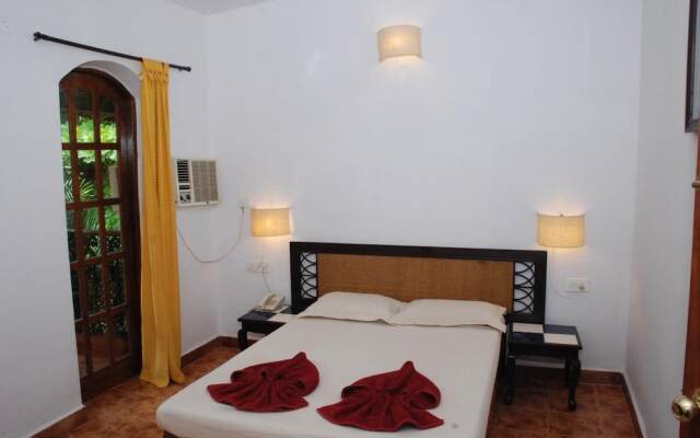 Capital O 322 Sea Breeze Candolim Hotel