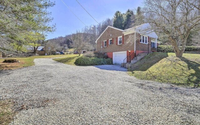 Quaint Creekside Home w/ Spacious Deck & Yard