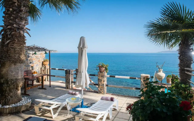 Exclusive Seaside Retreat with Shared Pool & Private Beach Access