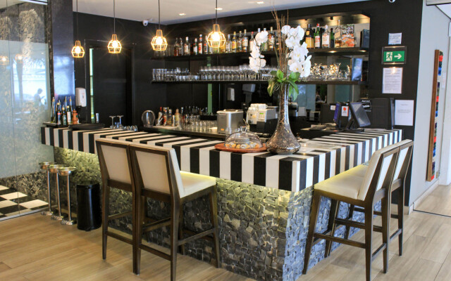 eSuites Savassi Toscanini