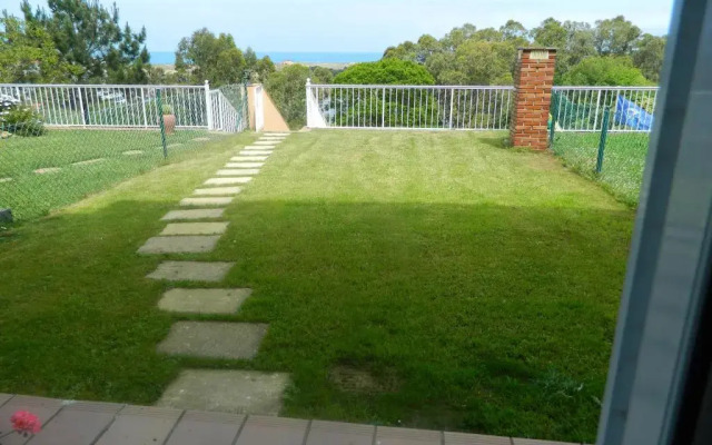 Apartamento con jardin privado junto playa Usil - Mogro