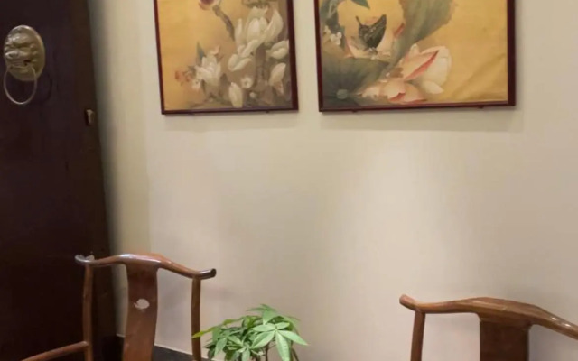 Qiuguo Hutong Courtyard Hotel