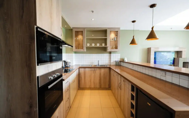 Trademark Suites at Enaki Town