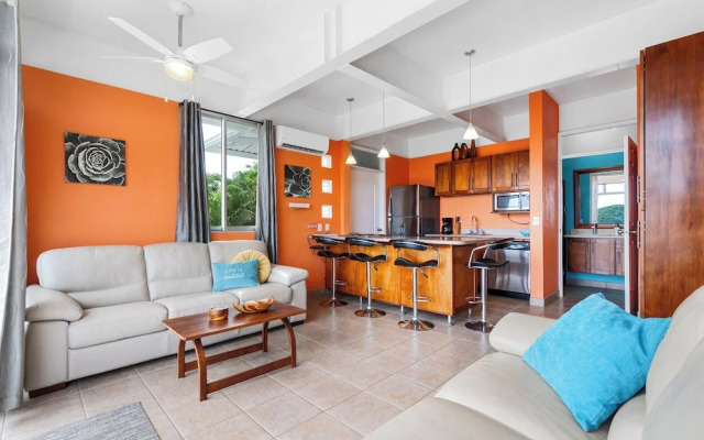 Modern Top-Floor Condo with Panoramic Views and Community Pool