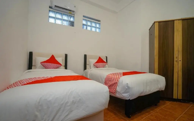 Super OYO 1844 Bravo Residence