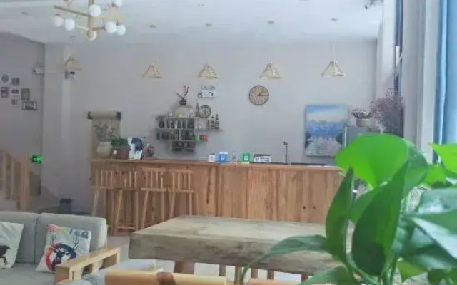 Xinping Xiaoguaijia Inn