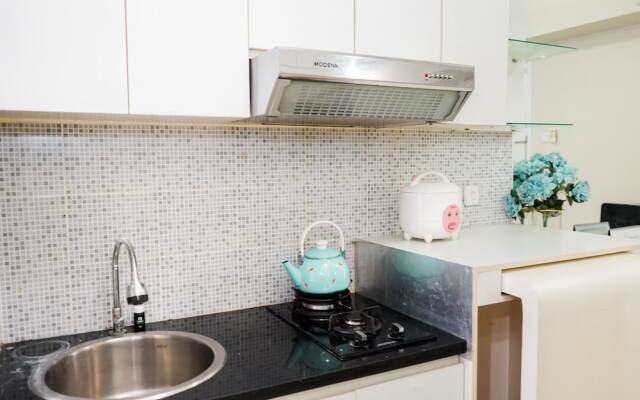 Homey 1BR with City View at Green Pramuka Apartment By Travelio