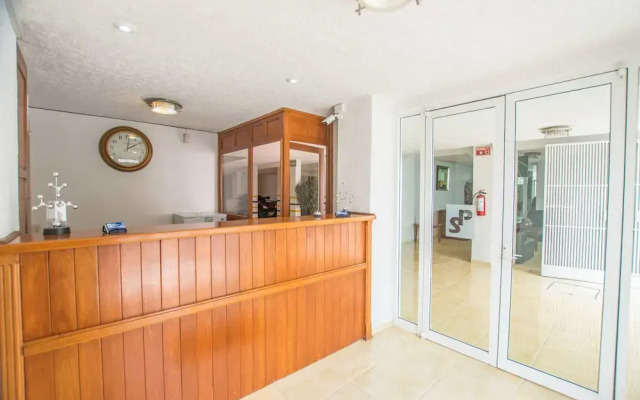 Suites Poliforum Inn