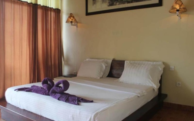 Penginapan Lakeside Cottages by ZUZU – Guest Rooms – Kintamani
