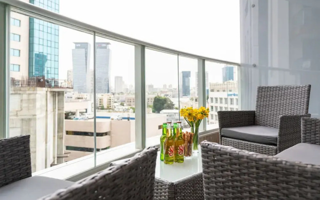 Sunlit Urban Escape with Balcony by Sea N Rent