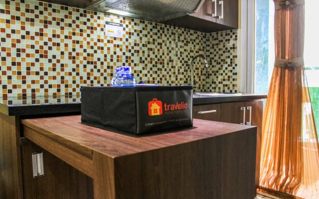 Comfortable and Tranquil 2BR Apartment at Green Pramuka By Travelio