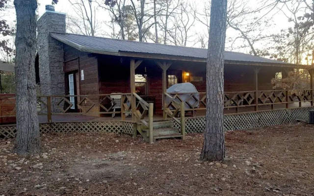 Cast Away Family Cabin with Hot Tub, Fireplace, and Kids Area by RedAwning