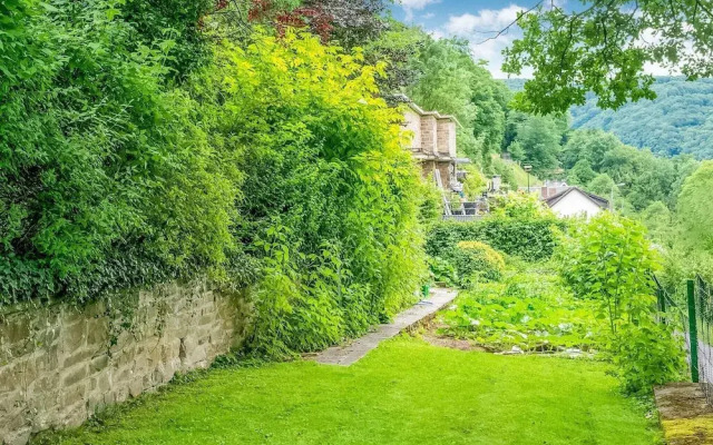 A Small Studio of a Nature Stone House