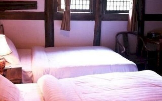 Emeishan Ziranxing Dujiabieyuan Hotel