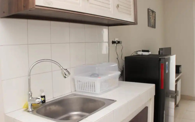 Cozy And Modern Studio Apartment At Springlake Summarecon Bekasi