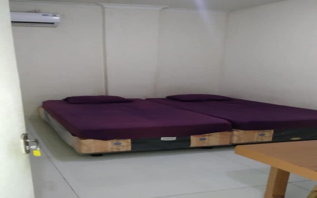 SPOT ON 93827 Rumah Kost Harapan Indah
