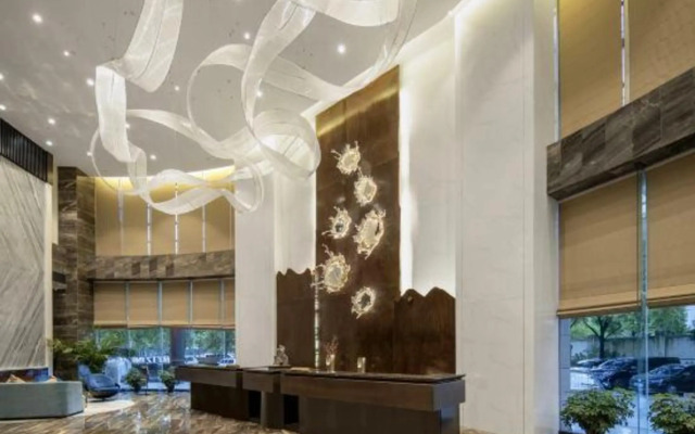 Taizhou Meizhu Hotel (Jiaojiang City Government Avenue Baolongcheng Store)