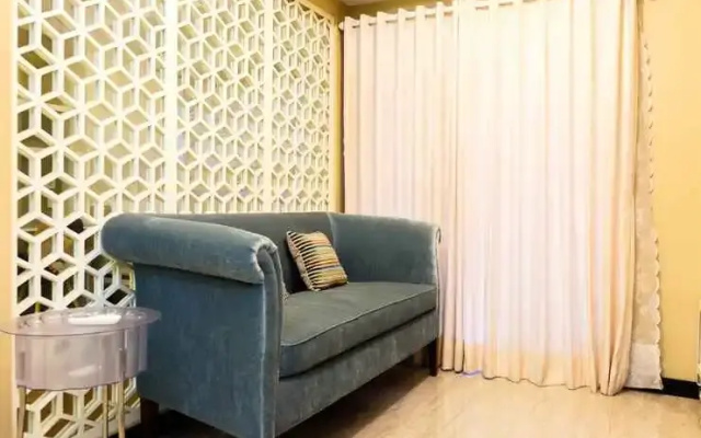 Relaxing 2BR with City View The Wave Apartment By Travelio