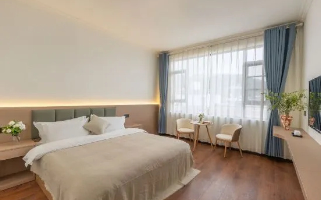 Lanshan Listening to the Wind · Snow Mountain Viewing and Vacation Beauty Hotel – Guest Rooms – Lijiang