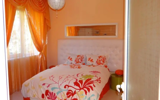 Orange Flower Apartments 1