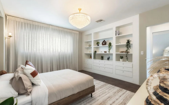 Stylish Hillside Retreat with Pool & Views