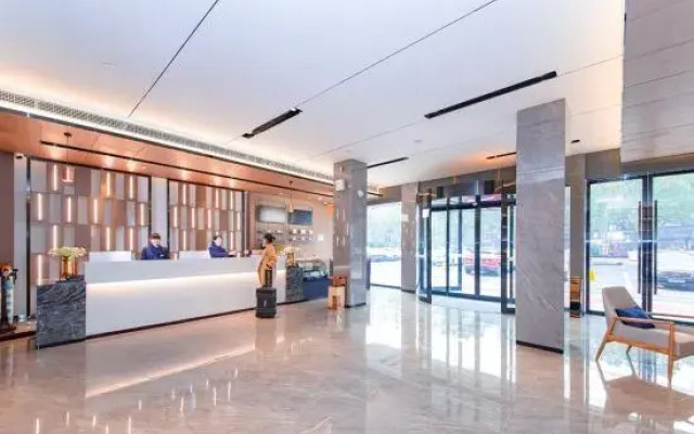 Yishang Hotel (Xiaozhishengcheng Gymnasium Shop)