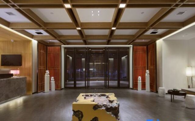 QIANNA HOTEL (Xinxiang Hualan Avenue Pangdonglai Shopping Plaza)