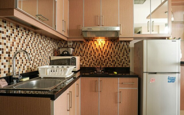 Strategic Location 1BR The Wave Apartment with City View