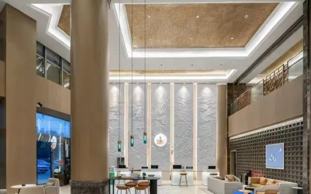 Elong Deluxe Hotel (Xuzhou Jiawang Wuyue Square)