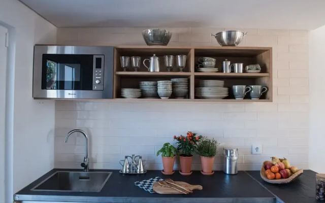 Craveiral Farmhouse by Belong