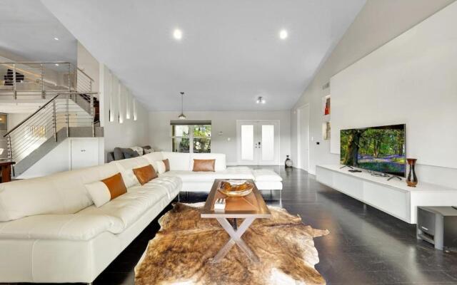 Blue stone lake home by PMI